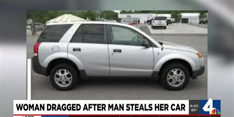 Woman dragged as man steals her car in O'Fallon